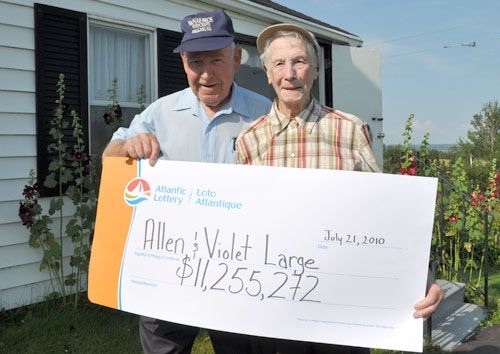 Lotto 649 Winners Violet and Allen Large With Oversized Cheque